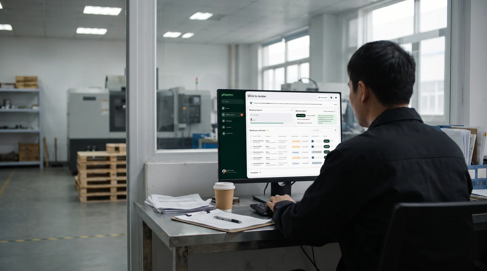 A supplier working through the SKUs a customer has asked them to review, in Phantm at their workshop desk.
